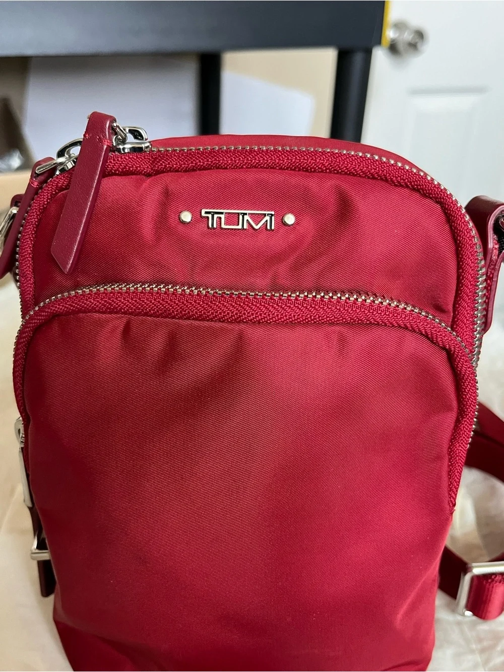 Tumi compact crossbody